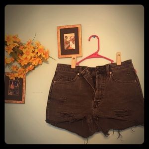 Distressed black jean shorts